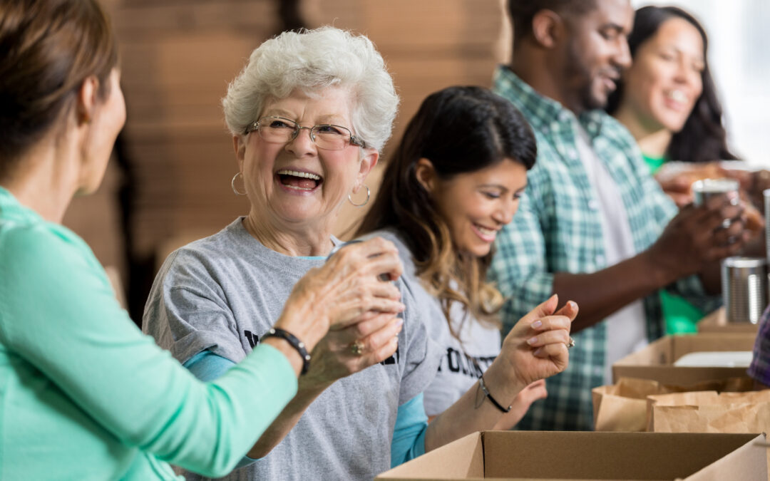 cheerful senior woman volunteering at a food bank